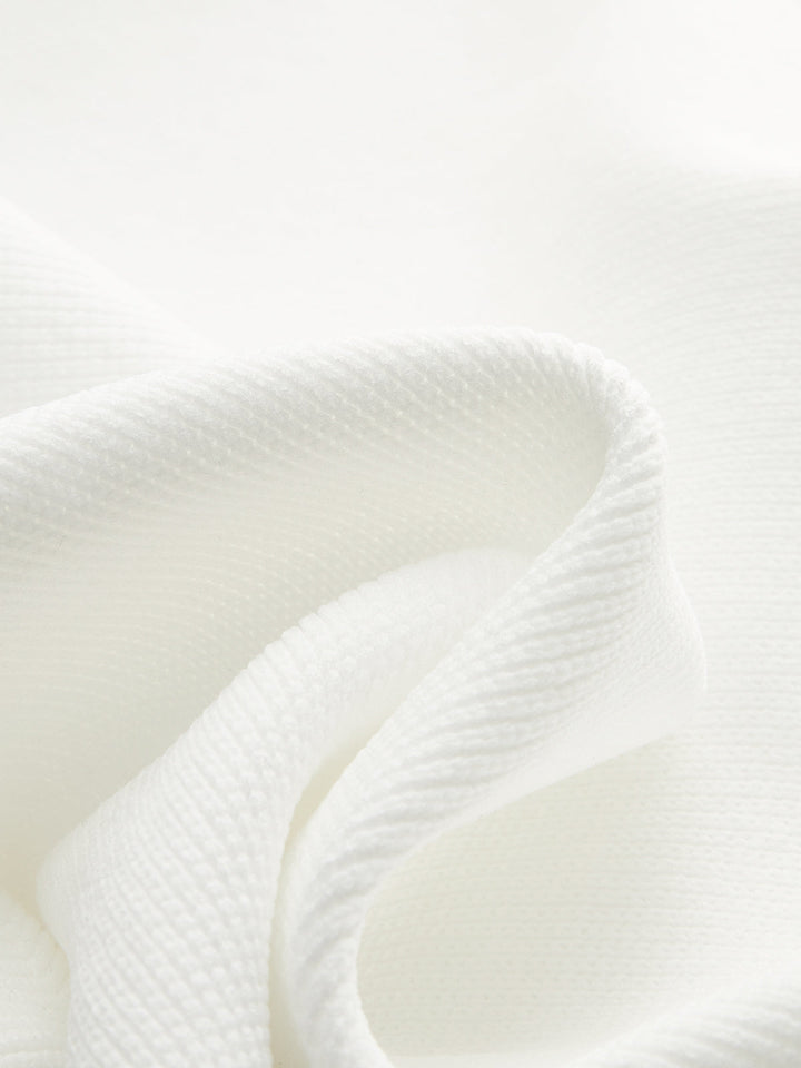 Short-Sleeved Peplum Cardigan  Liora Lane Boutique Cardigans