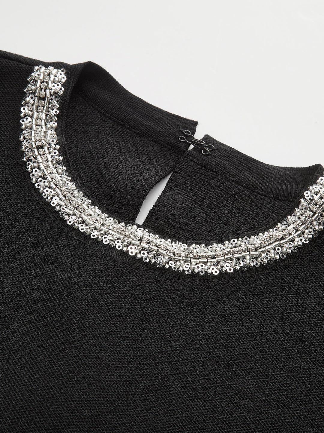 Sleeveless Flared Dress with Sequin Embellishments  Liora Lane Boutique Sweater Dresses