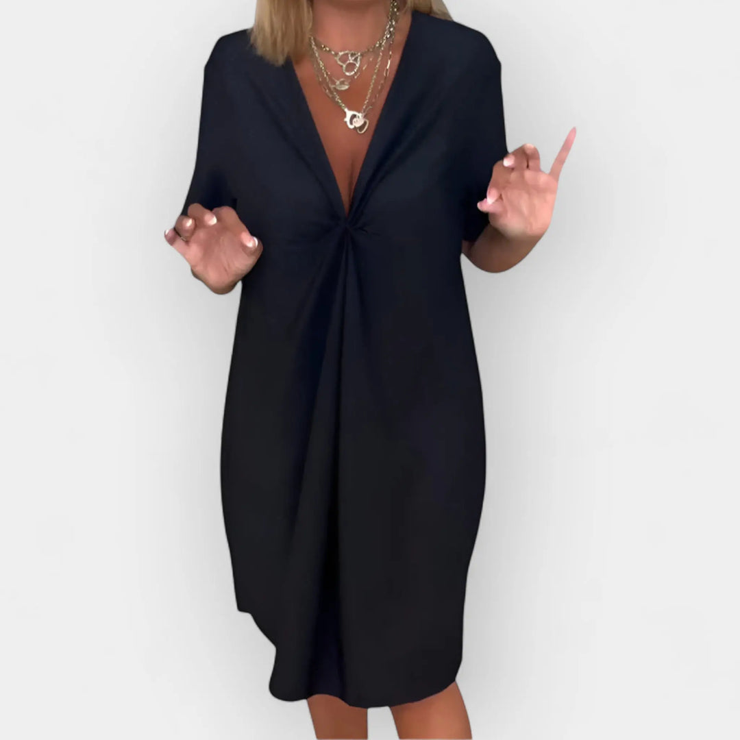 Elegant dress with V neckline and decorative hem Jasmine's Boutique Australia