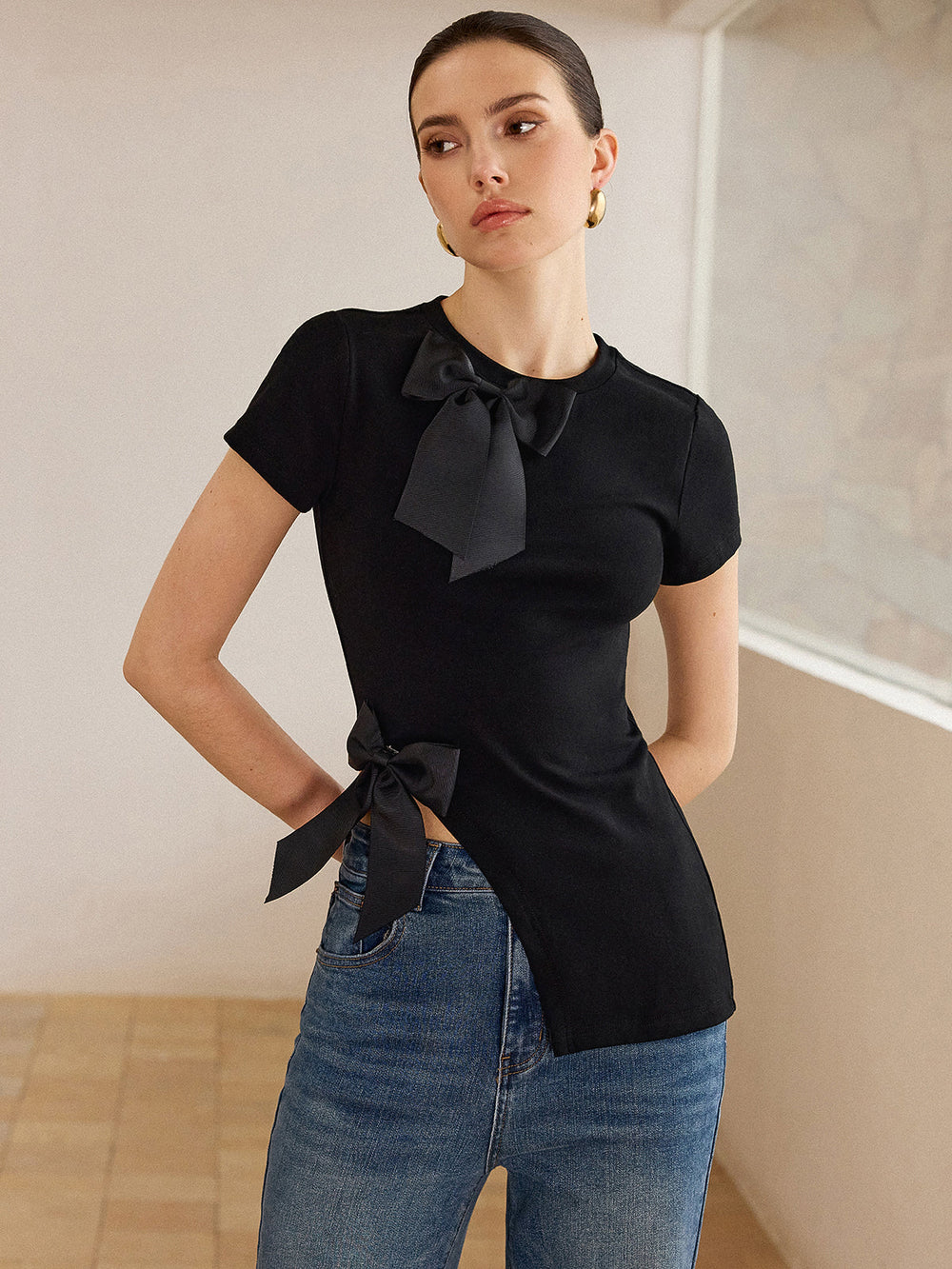 3D Bow-Detailed Top with Asymmetric Hem  Liora Lane Boutique T-Shirts