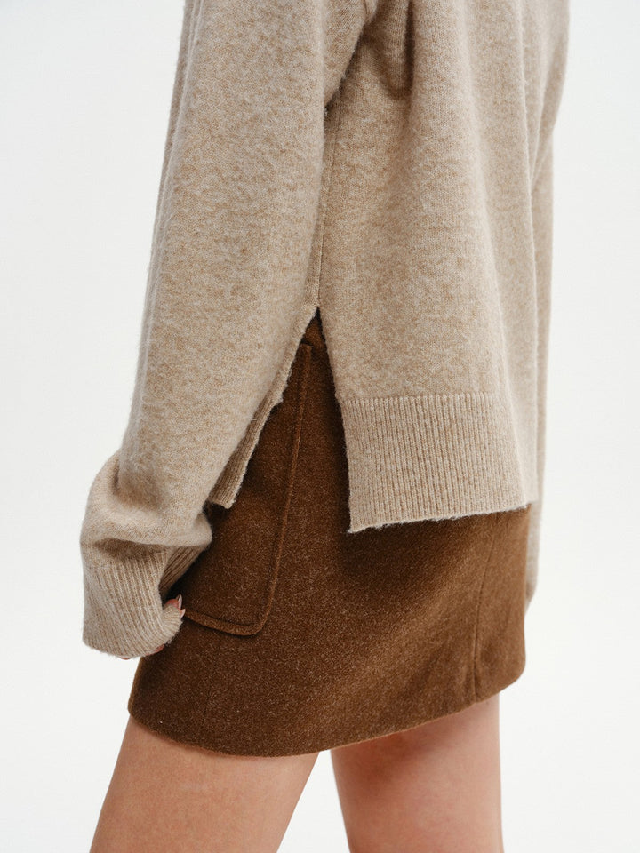 Wool-Blend V-Neck Sweater with Side Slit  Liora Lane Boutique Sweaters